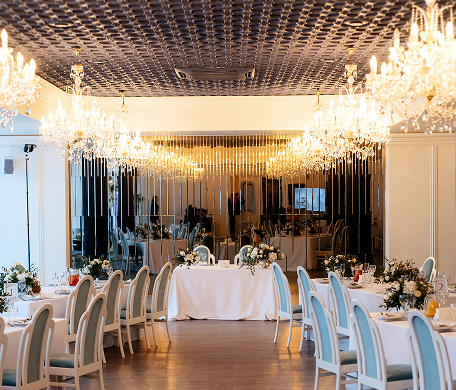 Empty chairs and tables in banquet hall